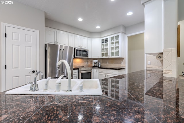32153 SE Bluff Rd, Gresham, OR 97080 - kitchen with stainless steel appliances, tile countertops, glass insert cabinets, white cabinets, and recessed lighting