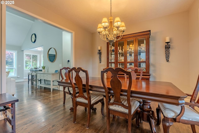32153 SE Bluff Rd, Gresham, OR 97080 - dining area with a chandelier, wood finished floors, and lofted ceiling