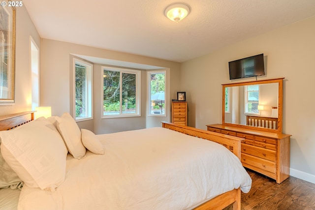 32153 SE Bluff Rd, Gresham, OR 97080 - bedroom featuring wood finished floors and baseboards