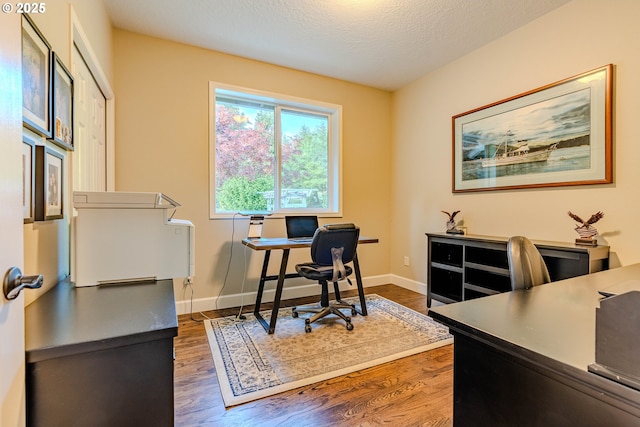 32153 SE Bluff Rd, Gresham, OR 97080 - home office with dark wood-style flooring and a textured ceiling