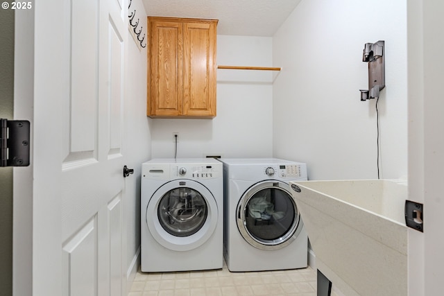 32153 SE Bluff Rd, Gresham, OR 97080 - laundry room featuring cabinet space and independent washer and dryer