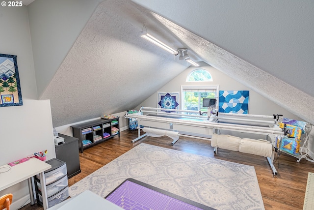 32153 SE Bluff Rd, Gresham, OR 97080 - bedroom with a textured ceiling, lofted ceiling, and wood finished floors