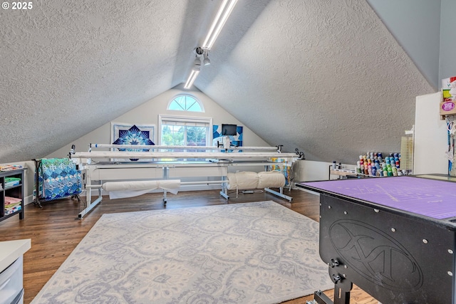 32153 SE Bluff Rd, Gresham, OR 97080 - bedroom featuring a textured ceiling, wood finished floors, and vaulted ceiling