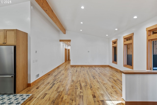 unfurnished living room with light wood-style flooring, recessed lighting, visible vents, and lofted ceiling with beams