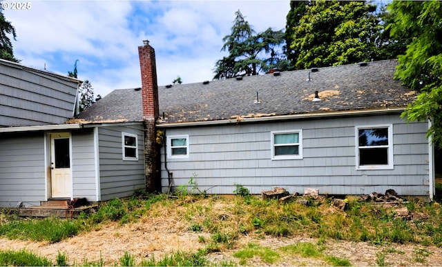 870 NE 3rd Ave, Hillsboro, OR 97124 - rear view of house featuring a chimney