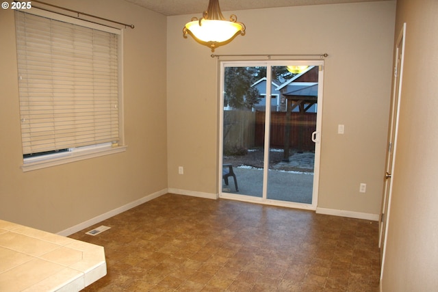 view of unfurnished dining area