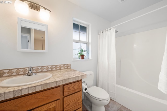 full bathroom with toilet, shower / tub combo, tile patterned flooring, and vanity