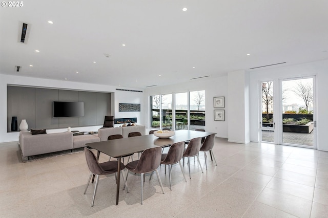 dining space featuring a wealth of natural light