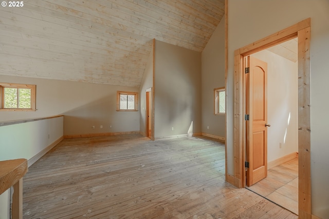 bonus room featuring baseboards, wood ceiling, lofted ceiling, and hardwood / wood-style floors