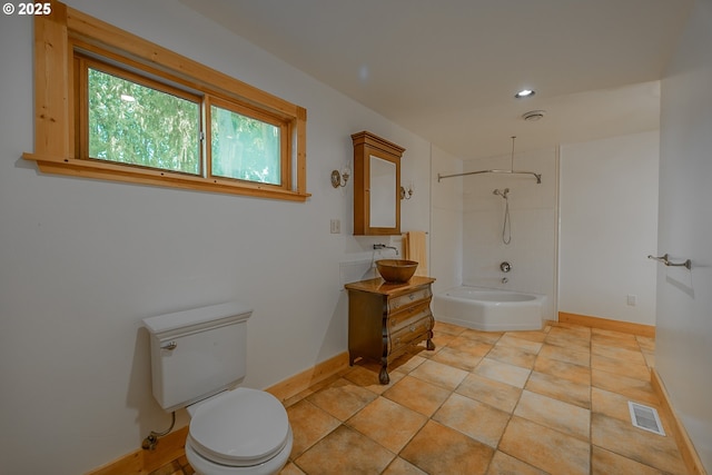 full bath featuring toilet, baseboards, visible vents, and bathtub / shower combination