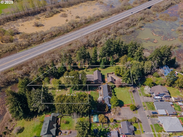 birds eye view of property with a residential view