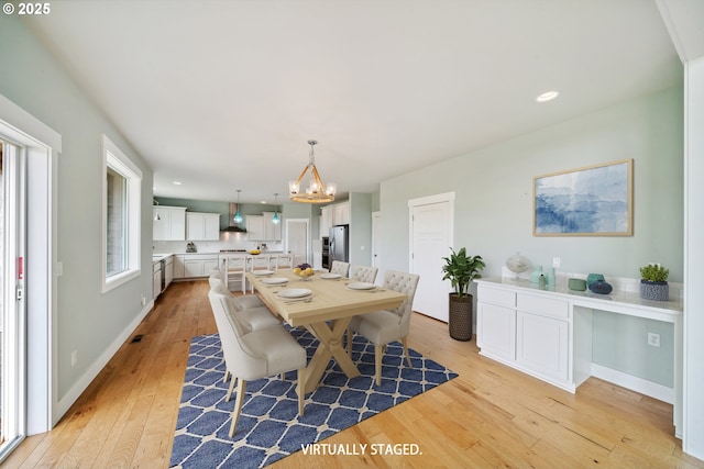 80654 Polo Ridge Rd, Warrenton, OR 97146 - dining room featuring light wood-style flooring, a chandelier, and recessed lighting