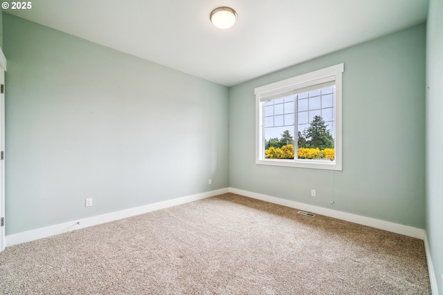 80654 Polo Ridge Rd, Warrenton, OR 97146 - empty room featuring carpet and baseboards