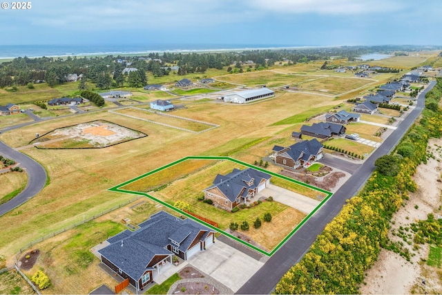 80654 Polo Ridge Rd, Warrenton, OR 97146 - aerial view of residential area with property boundaries highlighted and a nearby body of water