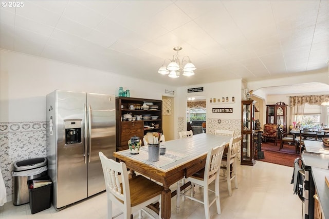 18050 SE Langensand Rd, Sandy, OR 97055 - dining room featuring a chandelier and arched walkways