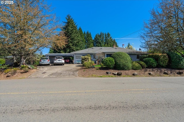 18050 SE Langensand Rd, Sandy, OR 97055 - single story home with driveway and an attached carport