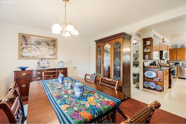 18050 SE Langensand Rd, Sandy, OR 97055 - dining space featuring a chandelier and arched walkways