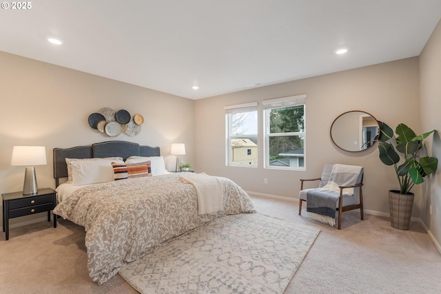 bedroom with light colored carpet