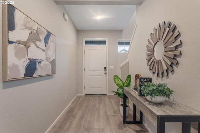 foyer with light wood-type flooring