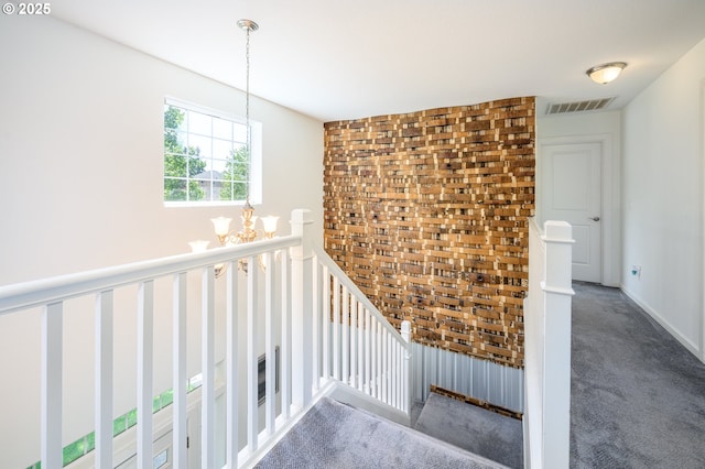 616 E 13th Pl, Lafayette, OR 97127 - staircase featuring a chandelier and carpet floors