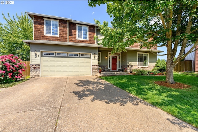 616 E 13th Pl, Lafayette, OR 97127 - view of front of home with stone siding, concrete driveway, and a garage