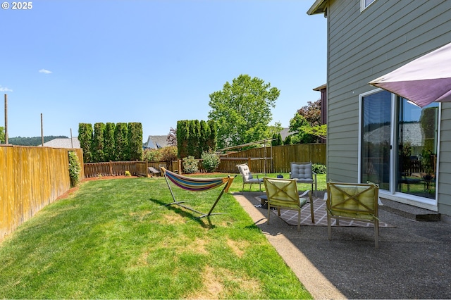 616 E 13th Pl, Lafayette, OR 97127 - fenced backyard featuring a patio and outdoor lounge area