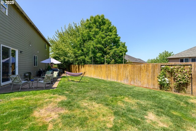 616 E 13th Pl, Lafayette, OR 97127 - fenced backyard with a patio