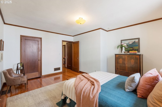 6040 SE 32nd Ave, Portland, OR 97202 - bedroom with wood finished floors and ornamental molding