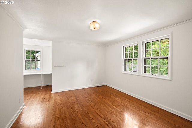 6040 SE 32nd Ave, Portland, OR 97202 - unfurnished room with wood finished floors and ornamental molding