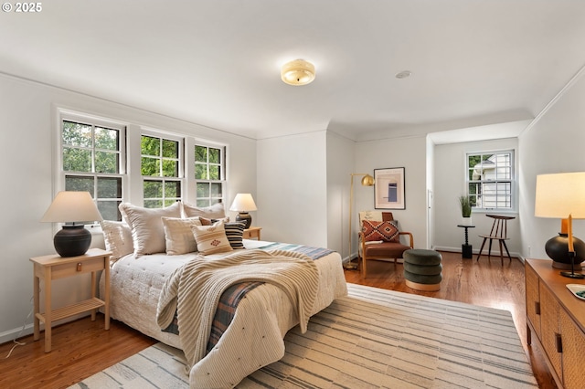 6040 SE 32nd Ave, Portland, OR 97202 - bedroom featuring wood finished floors and crown molding