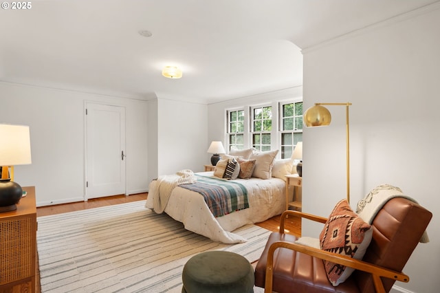6040 SE 32nd Ave, Portland, OR 97202 - bedroom with wood finished floors and ornamental molding