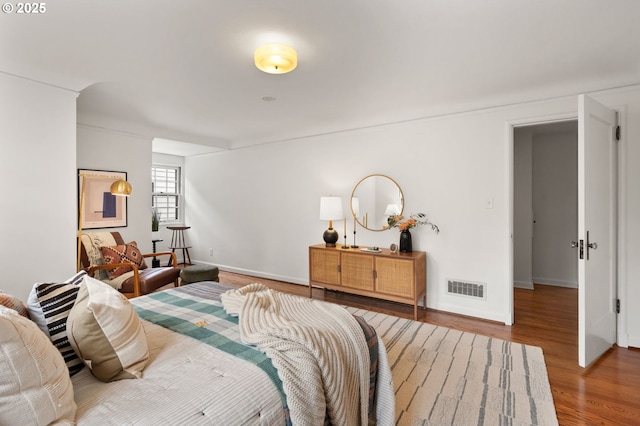 6040 SE 32nd Ave, Portland, OR 97202 - bedroom featuring wood finished floors and baseboards