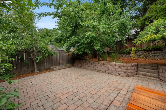 6040 SE 32nd Ave, Portland, OR 97202 - fenced backyard with a patio area