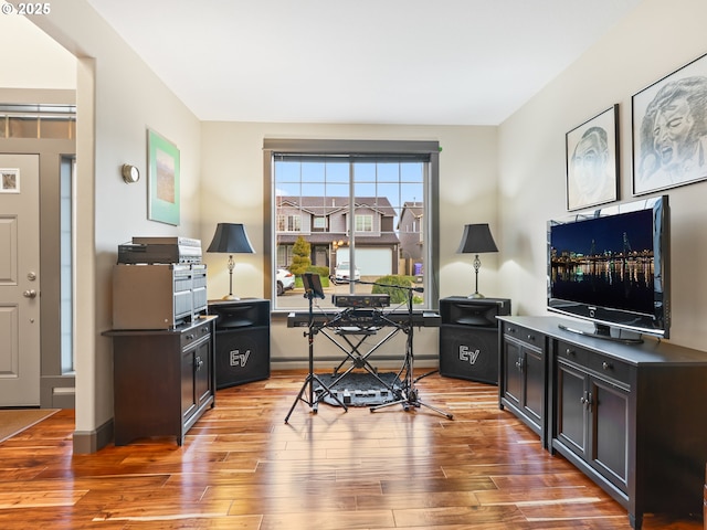 office space with wood finished floors