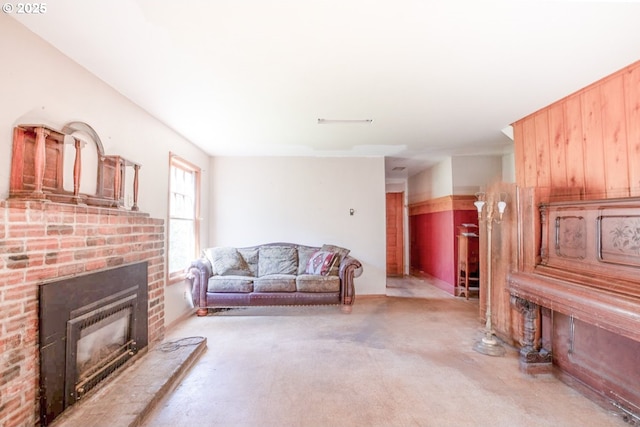 66756 Waymire Rd, North Bend, OR 97459 - living area with a fireplace and concrete floors