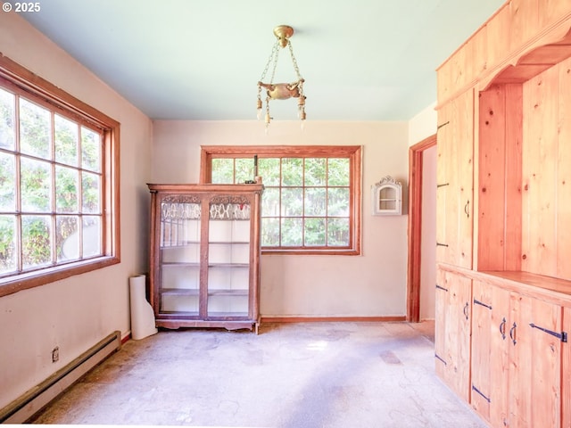66756 Waymire Rd, North Bend, OR 97459 - spare room with a baseboard radiator and light colored carpet