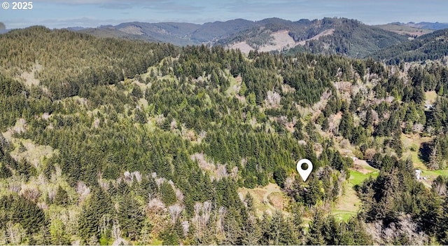 66756 Waymire Rd, North Bend, OR 97459 - property view of mountains with a wooded view