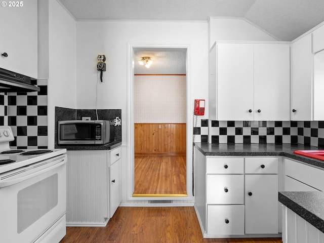 kitchen featuring a textured ceiling, white cabinetry, decorative backsplash, electric range, and range hood