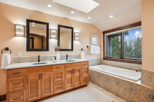 full bath featuring a sink, recessed lighting, tile patterned flooring, and double vanity