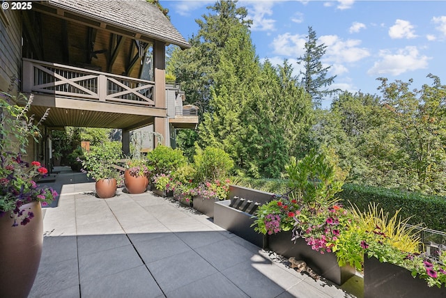 view of patio / terrace with a balcony
