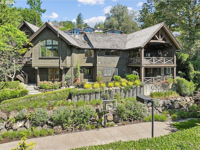 view of front of property with a balcony