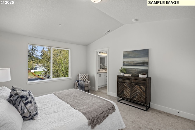 168 SE 47th Ave, Hillsboro, OR 97123 - bedroom featuring vaulted ceiling, light carpet, baseboards, a textured ceiling, and ensuite bathroom