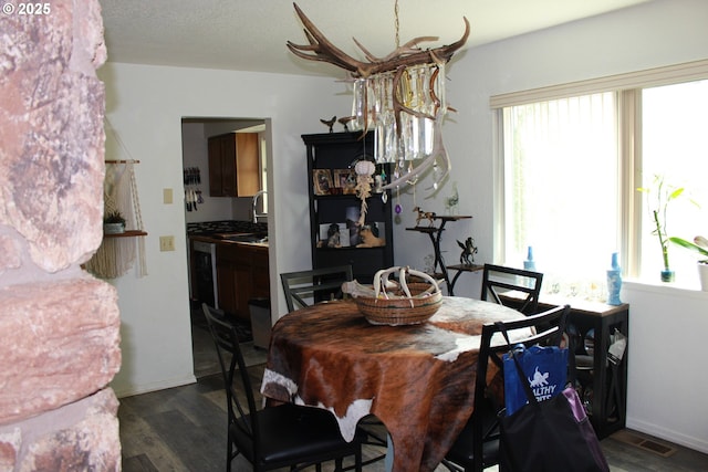 1783 View St, Myrtle Point, OR 97458 - dining room featuring dark wood-style floors and baseboards