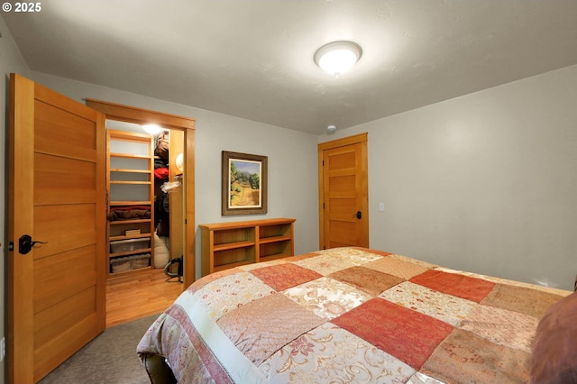 24780 Lavell Rd, Junction City, OR 97448 - bedroom featuring a spacious closet, a closet, and carpet