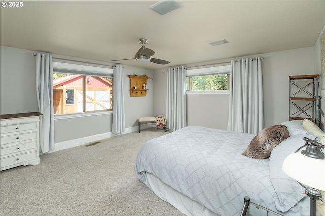 bedroom with carpet flooring, baseboards, and ceiling fan