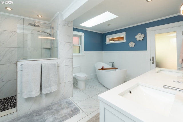 bathroom featuring a skylight, ornamental molding, walk in shower, marble look tiles, and a freestanding tub
