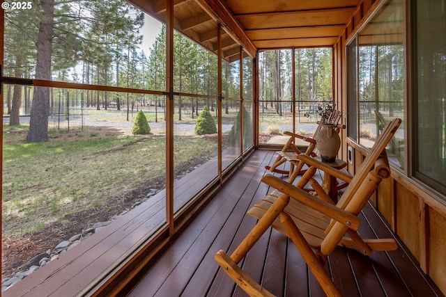 sunroom featuring hardwood / wood-style flooring