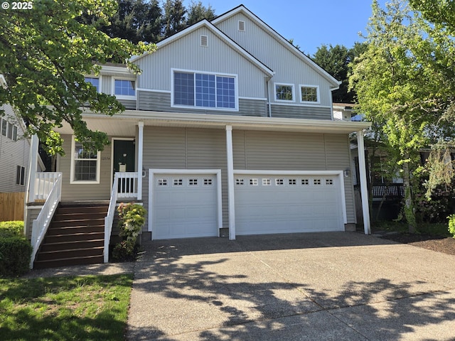 12174 SW Quail Creek Ln, Portland, OR 97223 - view of front of property with an attached garage and driveway
