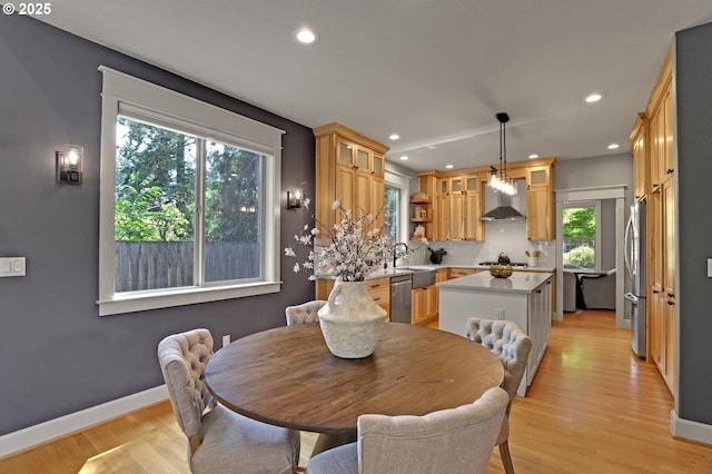 850 NW 114th Ave, Portland, OR 97229 - dining space with light wood-style flooring, recessed lighting, and baseboards