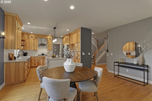 850 NW 114th Ave, Portland, OR 97229 - dining space featuring light wood-style floors, recessed lighting, stairs, and baseboards